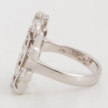 Step-cut diamond ring.