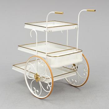 a serving trolley purchased at Firma Svenskt Tenn in the middle of the 20th century.