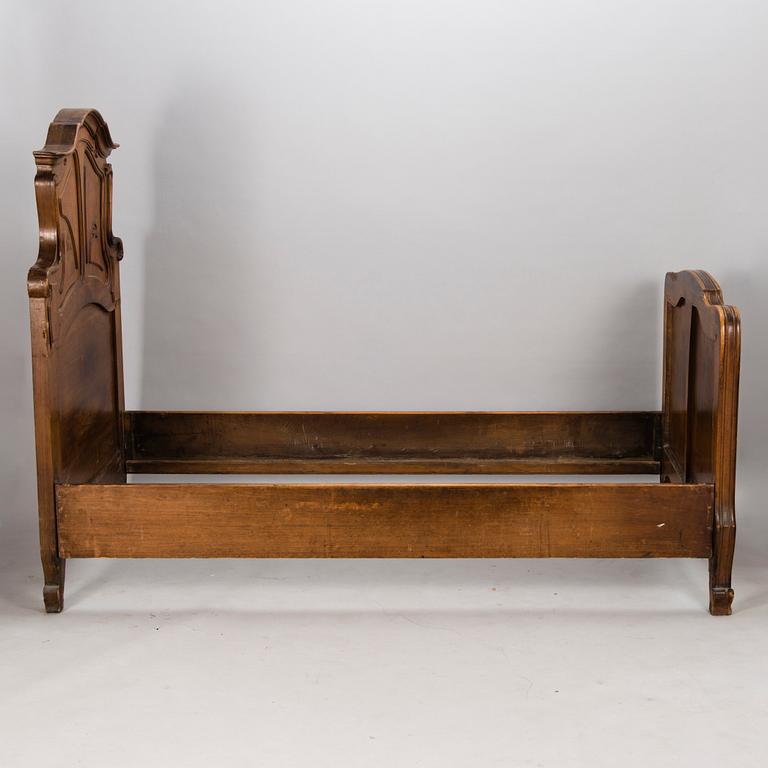 A pair of early 20th Century art nouveau style beds.