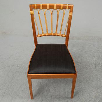A set of four mahogany and rattan dining chairs, Josef Frank, , model 1165, Svenskt Tenn, Stockholm.
