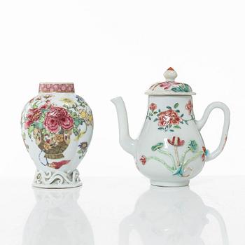 A Chinese porcelain teacaddy, a jug with cover, a cup and a cover, Qing dynasty, 18th century.