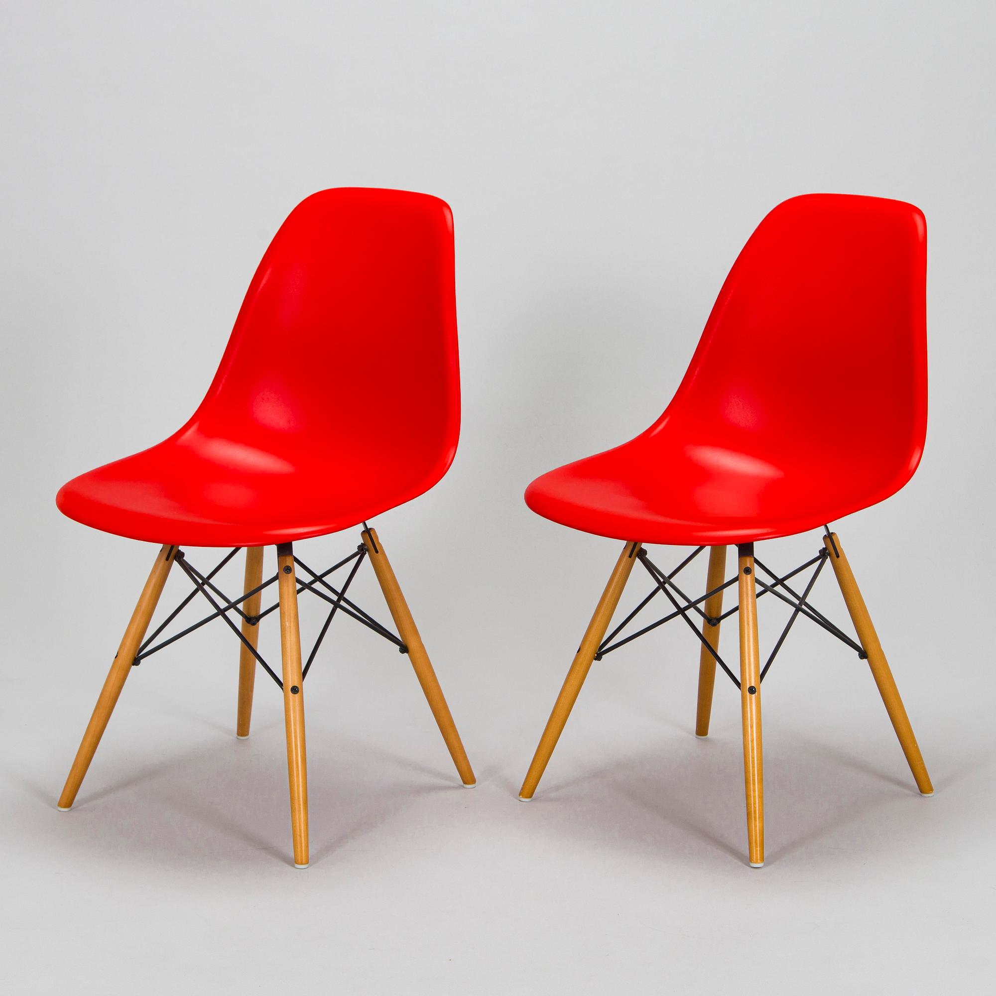 Charles & Ray Eames, two 'Plastic Chair DSW' chairs, Vitra.
