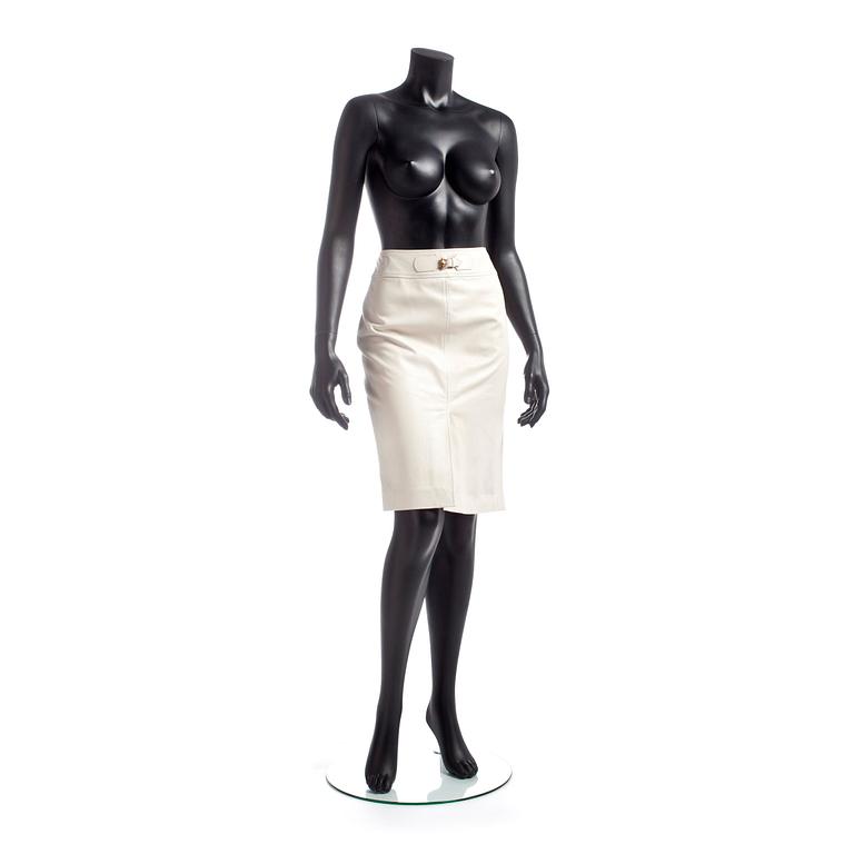 GUCCI, a white leather skirt.