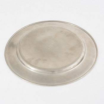 Svenskt Tenn, eight pewter charger plates, Stockholm 1950s-70s.