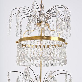 A late Gustavian gilt brass and cut glass eight-branch chandelier, Stockholm, late 18th century.
