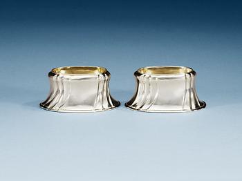 A pair of Swedish parcel-gilt salts, makers mark of Jonas Thomasson Ronander, Stockholm 1749 and 1755.