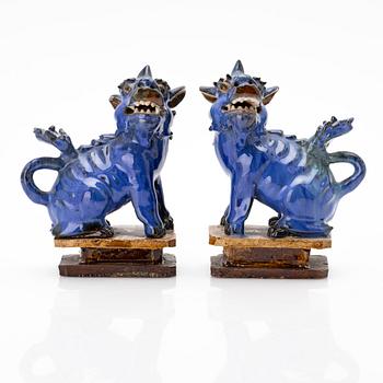 A pair of Chinese buddhist lions, Qing dynasty, 19th century.