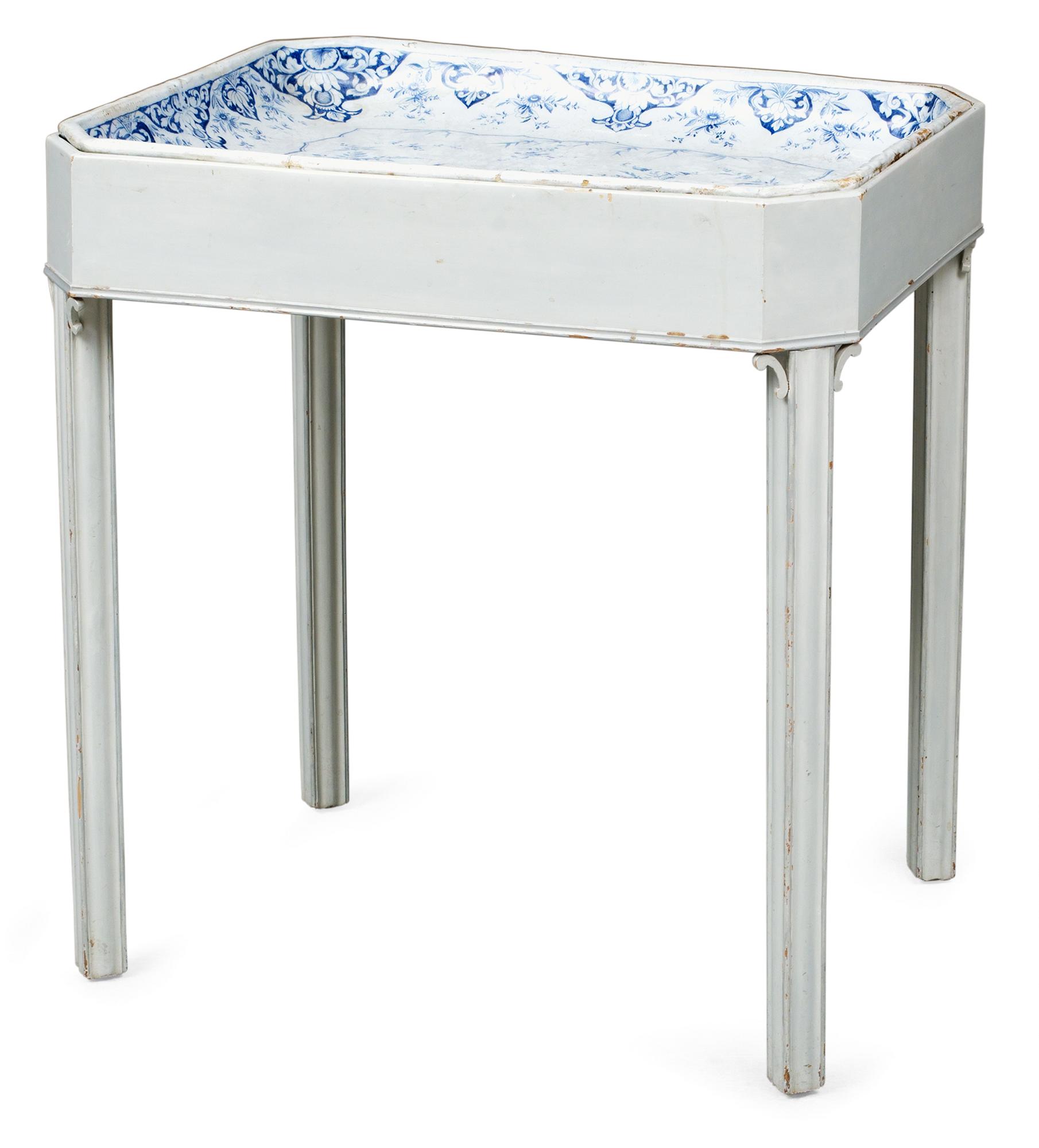 A Swedish Rörstrand faience tea table dated 1745.