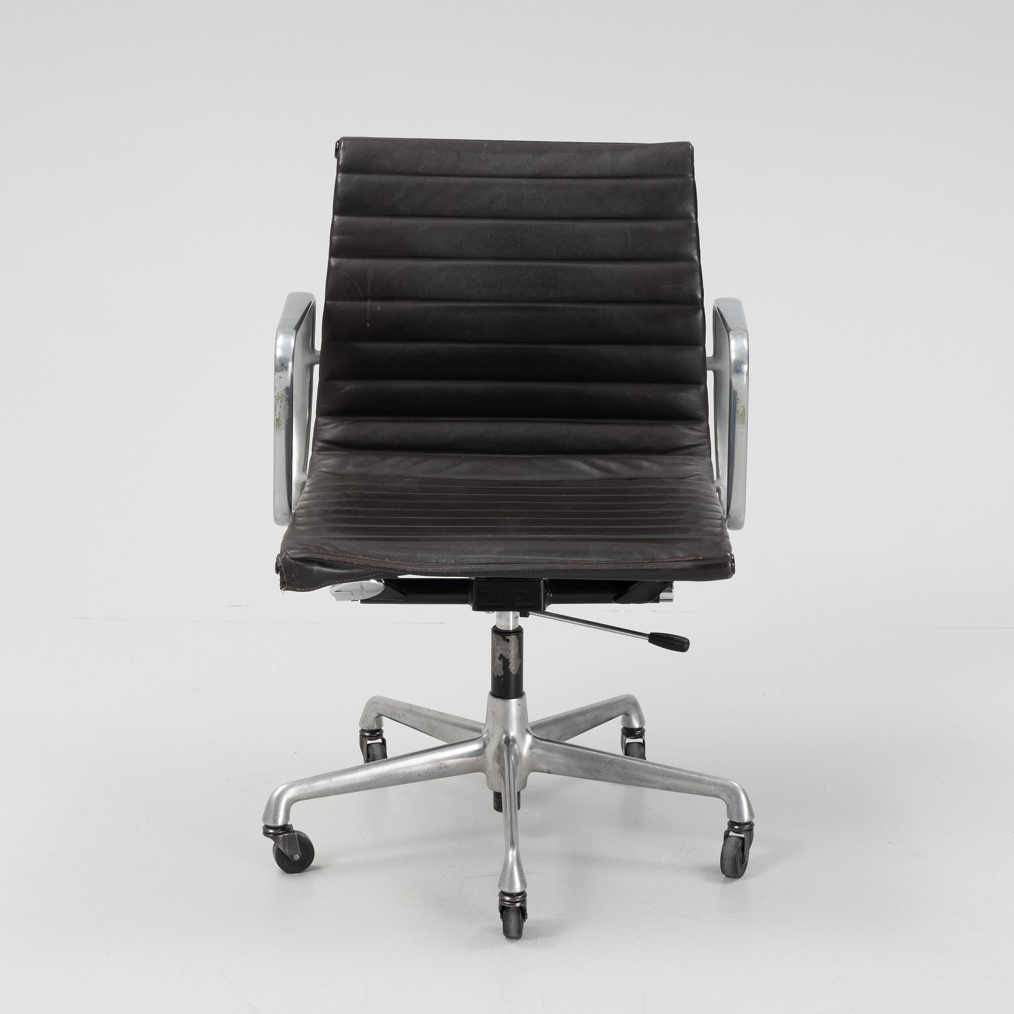 An EA 118 swivel office chair by  Charles and Ray Eames for Herman Miller, designed 1958.
