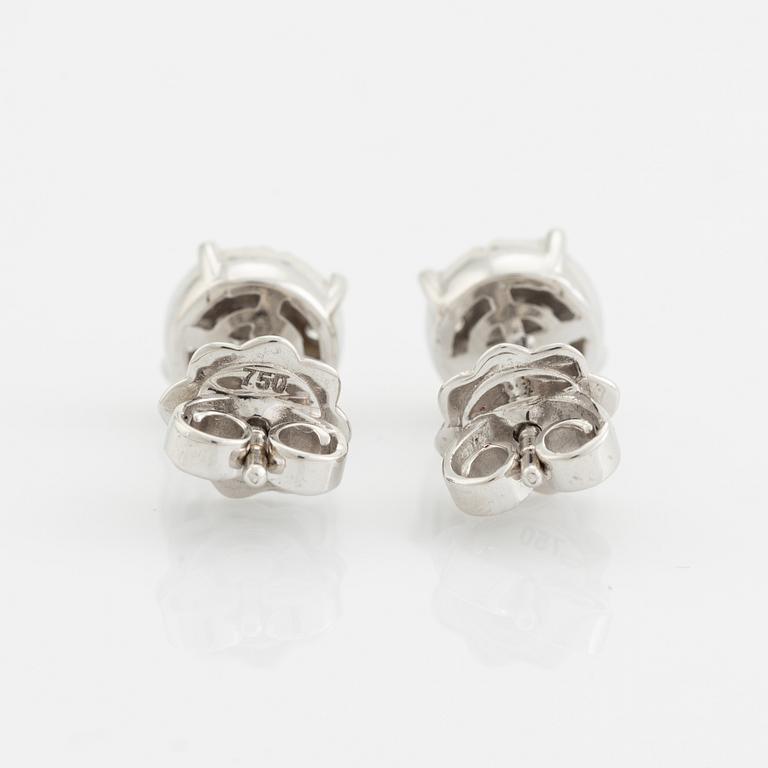 Brilliant cut diamond earrings, total ca 0,47 ct.
