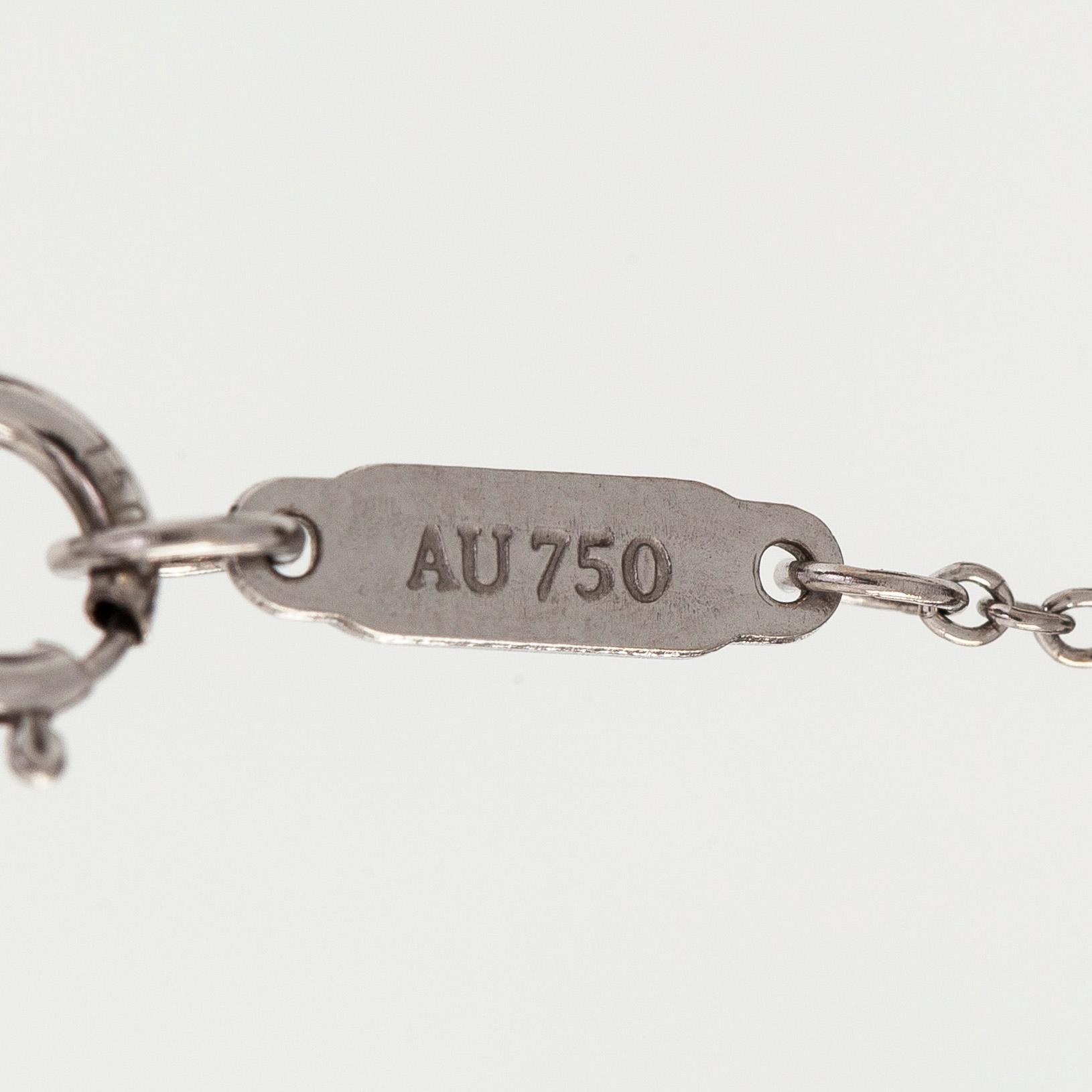 Tiffany & Co, halsband "Metro Cross", 18K vitguld och diamanter.