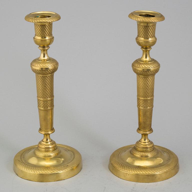 LJUSSTAKAR, ett par, Empire, mässing, 1800-talets mitt.