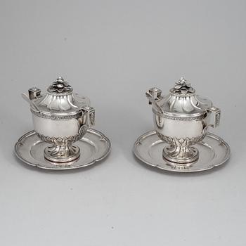 A pair of Swedish gustavian style silver sugar bowls with spoons and on tray, marked JE Torsk, Stockholm 1902.