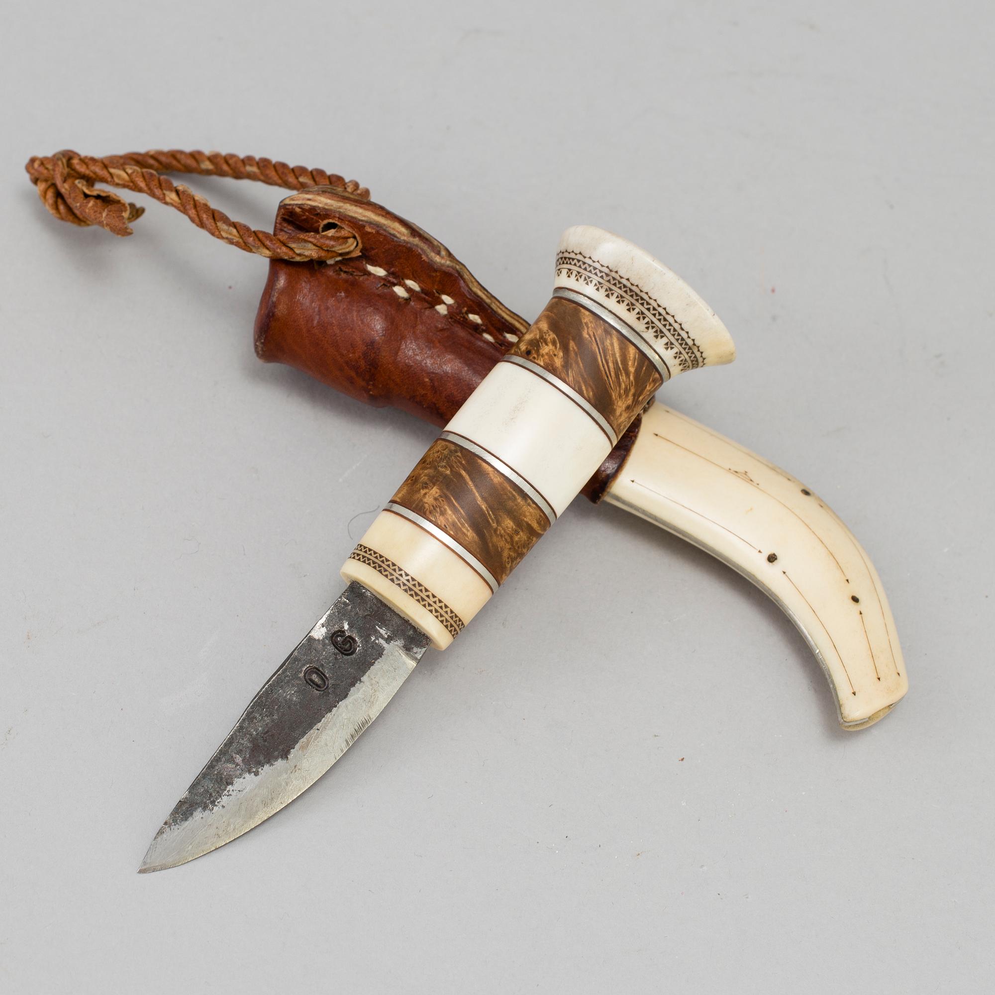 A traditional sami knife. Signed with unknown signature.