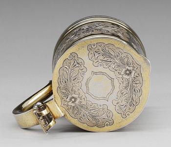 A RUSSIAN SILVER-GILT TANKARD, unidentified makers mark, Moscow 1874.