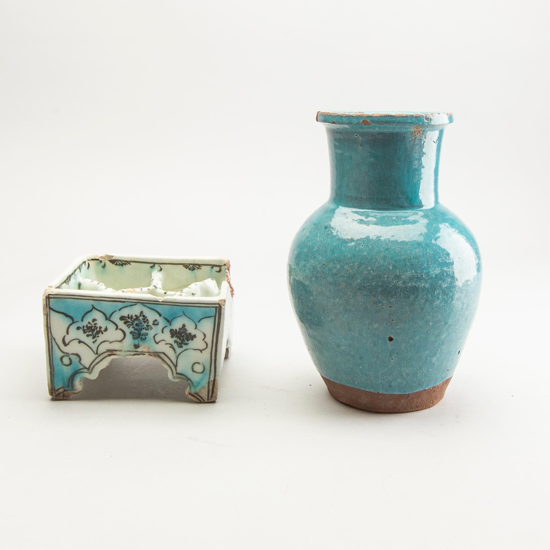 A group of four persian ceramics, 17th/19th Century.