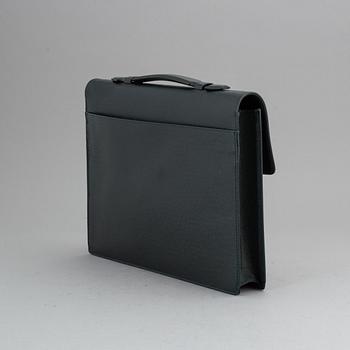 LOUIS VUITTON, a 'Taiga Serviette Kourad' briefcase.