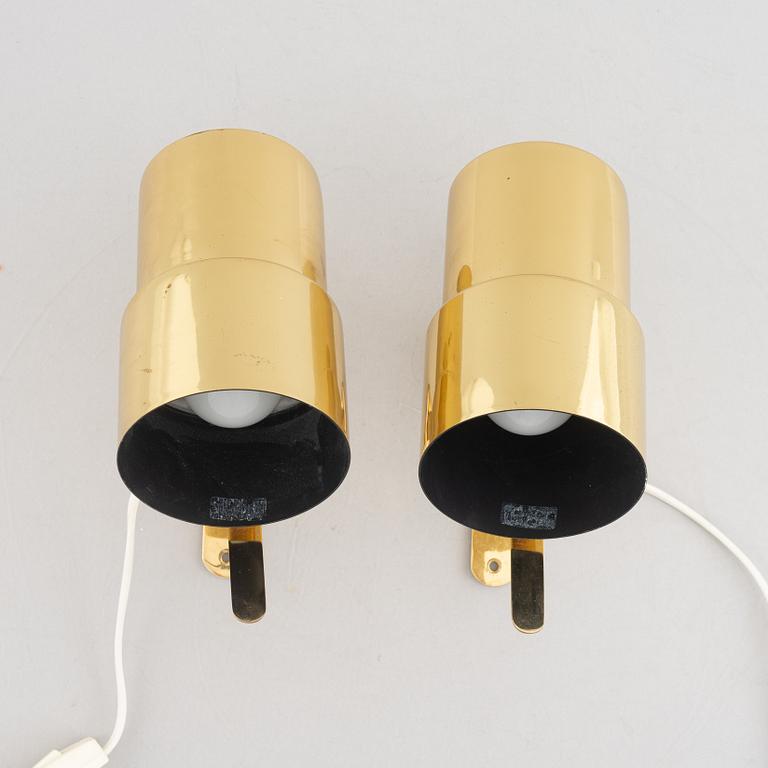 Hans-Agne Jakobsson, a pair of wall lamps, model V324, Markaryd, late 20th century.