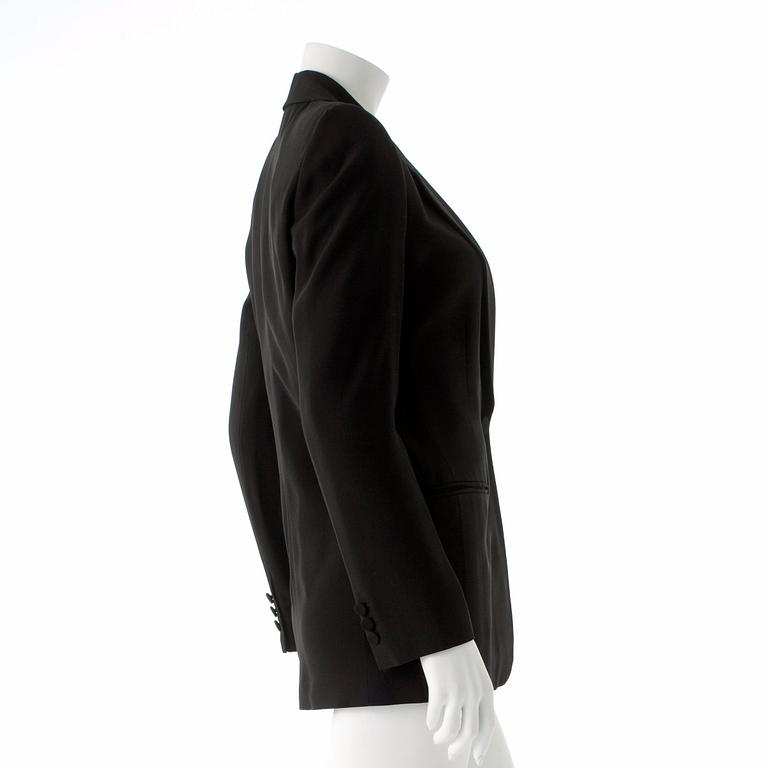 EMPORIO ARMANI, a black suit jacket.