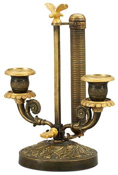 1051. A late Empire table lamp.
