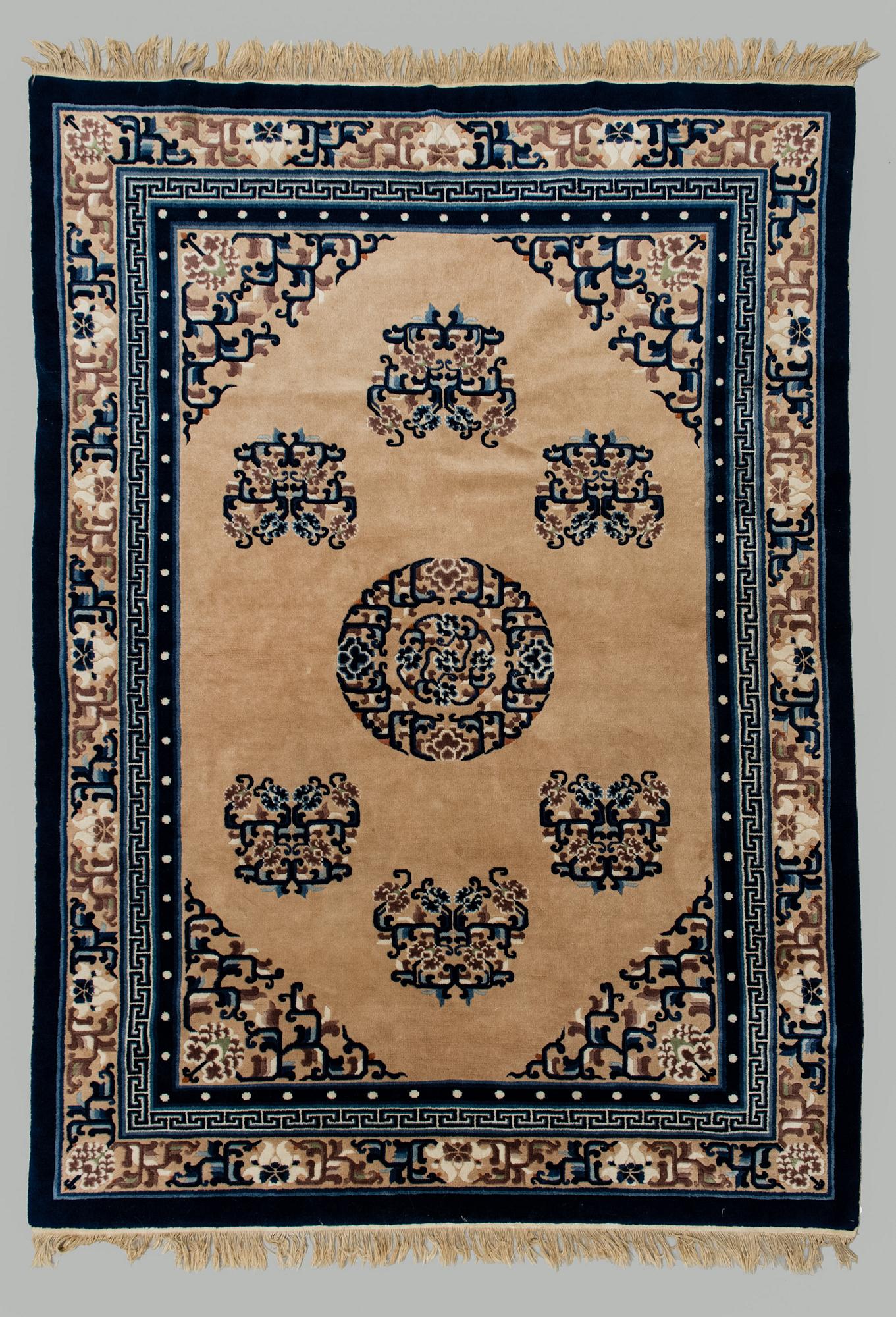 A Chinese carpet, ca 244 x 168 cm.