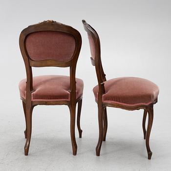 Sofa, 2 armchairs, 4 chairs, table and banquet, Rococo style, 20th century.