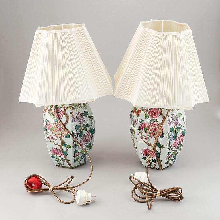 A pair of Chinese famille rose vases, turned into table lamps, 20th century.