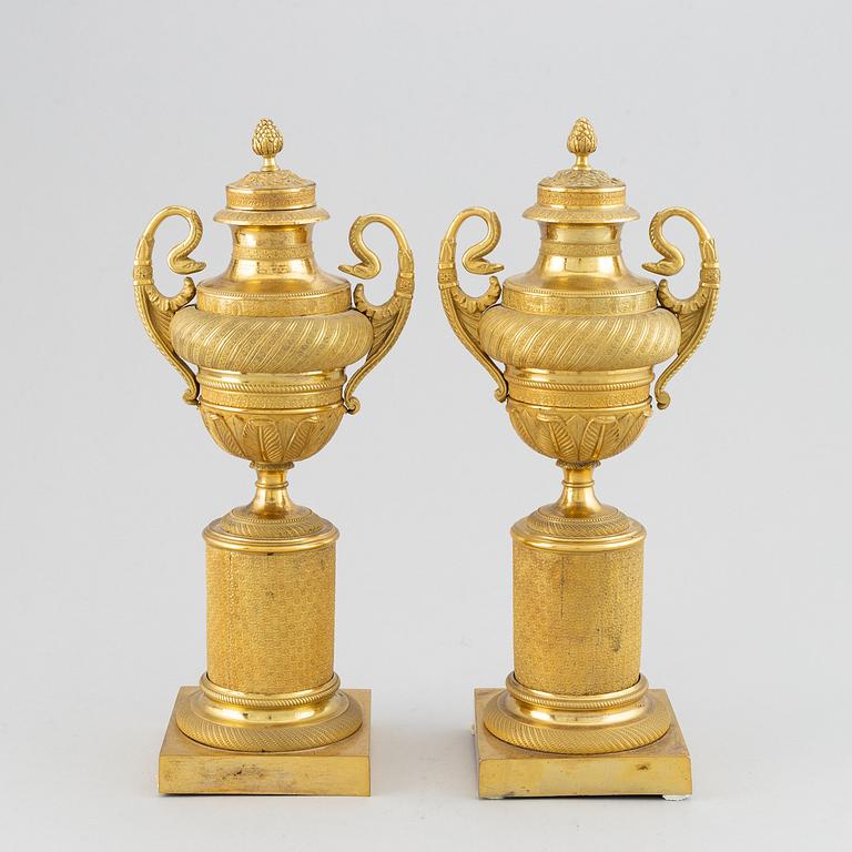 A pair of French Empire candlesticks, early 19th century.