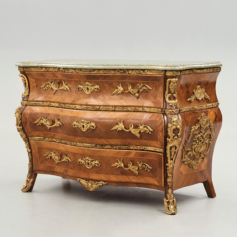 A Swedish Rococo chest of drawers by Christian Linning dated 1761 (master in Stockholm 1744-1779).