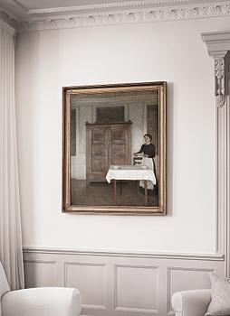 Vilhelm Hammershöi, "Pigen daekker Bord" (The maid laying the table).