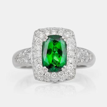 A 1.99 ct untreated tsavorite garnet and brilliant-cut diamond ring. Total carat weight of diamonds circa 1.35 ct.