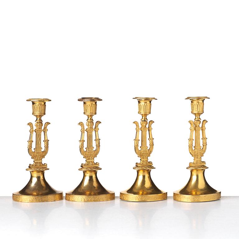 Four Russian Empire candlesticks, beginning of the 19th century.