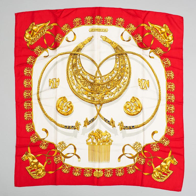 Hermès, a 'Les Cavaliers d'Or' silk scarf.