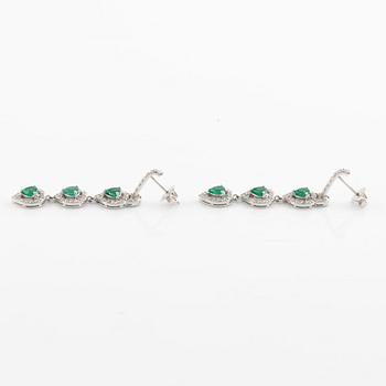 Emerald and brilliant cut diamond earrings.