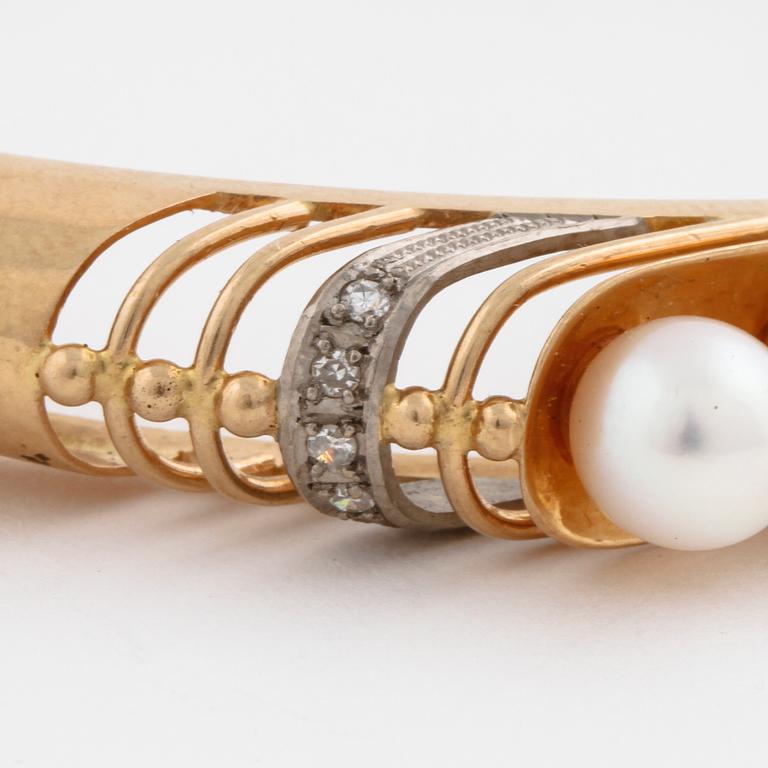 A cultured pearl and single cut diamond bangle by Svedboms, Vetlanda, 1968.