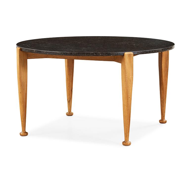 Josef Frank, a black marble top table, model 960, walnut base, Svenskt Tenn, 1950's.