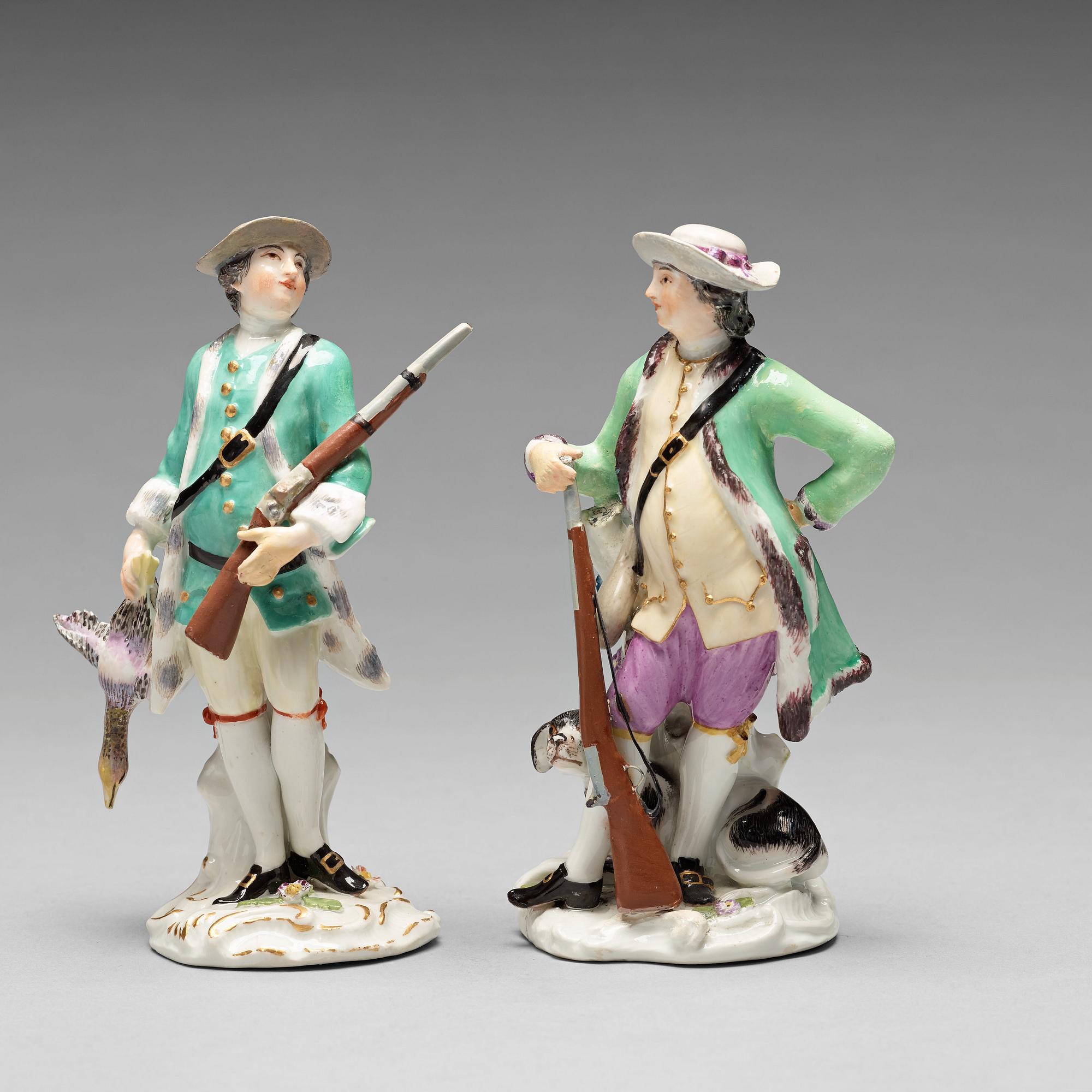 Two Meissen porcelain figures of huntsmen, 18th Century.