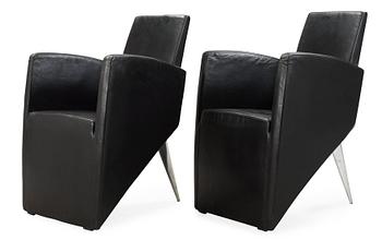 A pair of  Philippe Starck black leather armchairs, 'J Serie Lang', Aleph, Italy.