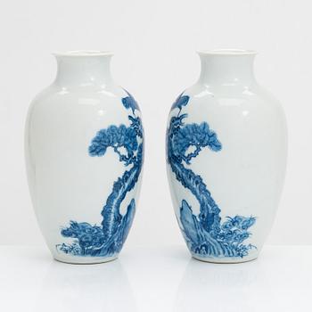 A pair of Chinese blue and white porcelain vases, 20th-century.