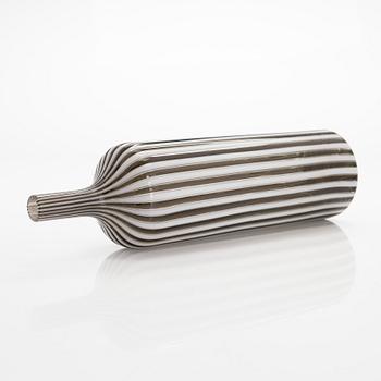 Gio Ponti, a glass bottle '4500' signed Venini, Murano and three drinking glasses, Italy.