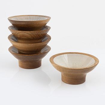 Magnus Ek, a set of five oak bowls for Oaxen Krog, 2020.