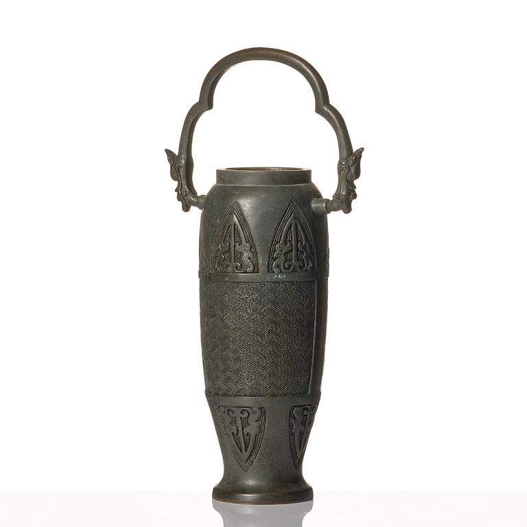 A bronze vase, late Qing dynasty with archaistic mark.