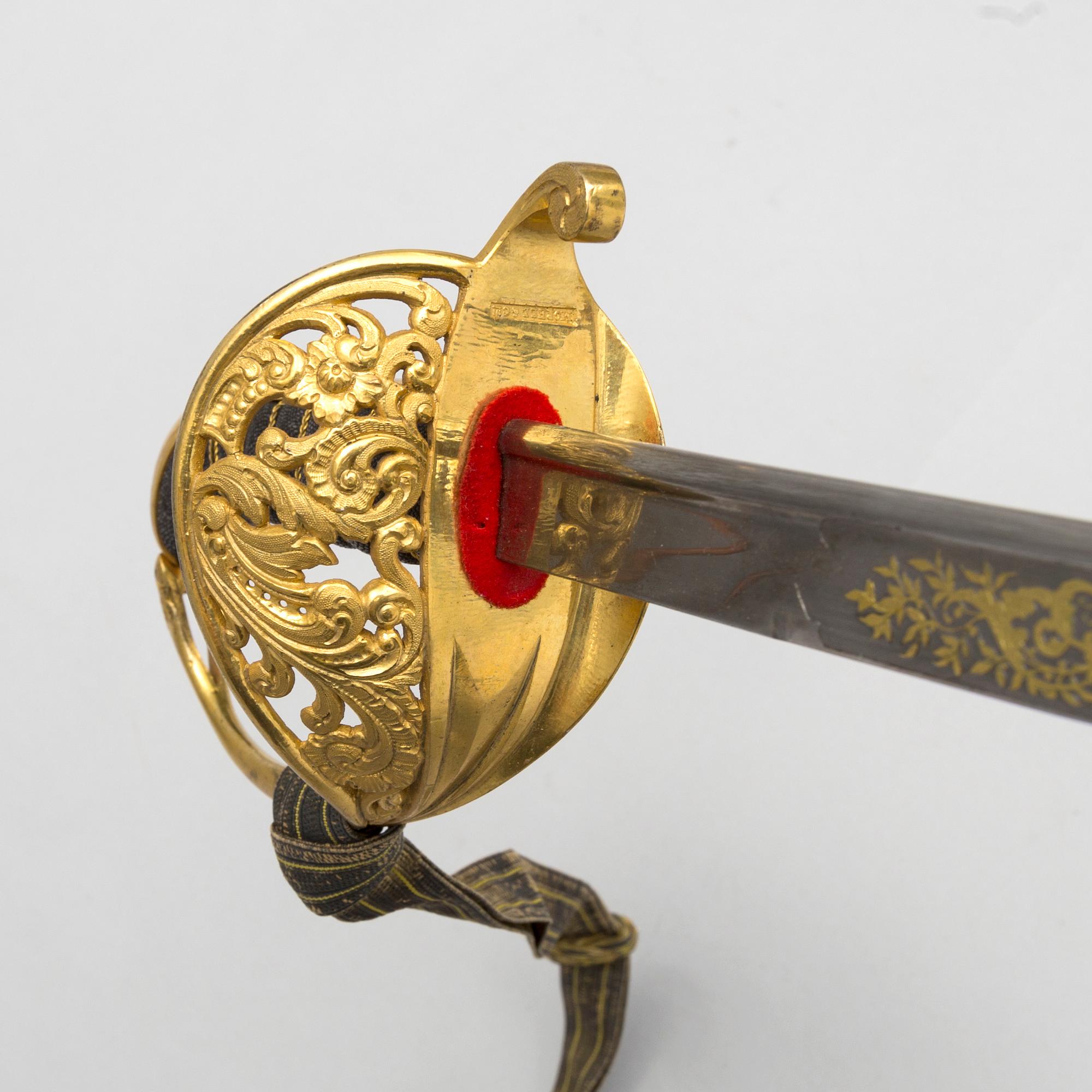 A Swedish second half of the 19th century sabre with scabbard.
