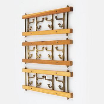 A group of three 'Dekorativ' coat hangers, Skoglunds metallgjuteri, Anderstorp, 1950's/60's.