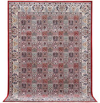 A Qum carpet, a. 346 x 251 cm.