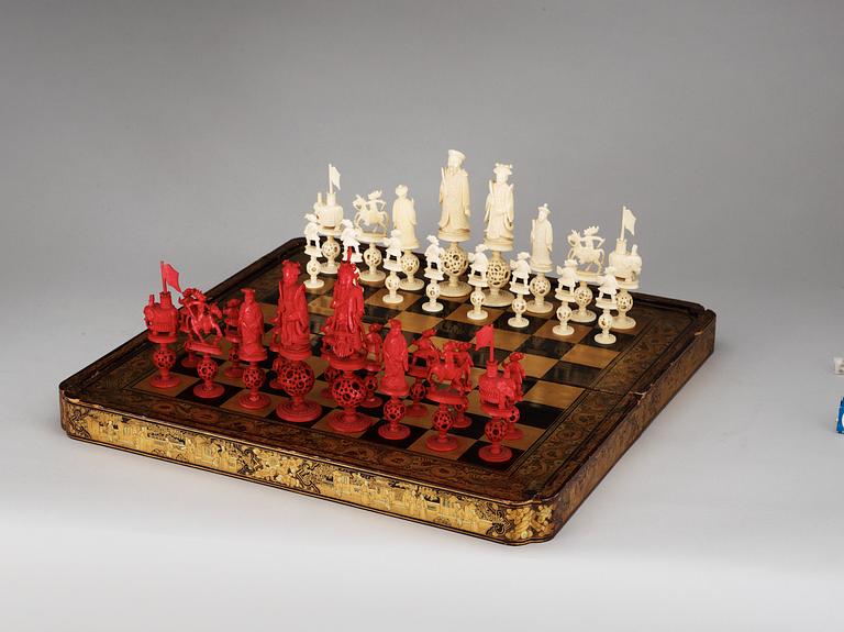 An large lacquered Games Box with ivory and bone Chess Pieces, Qing dynasty.