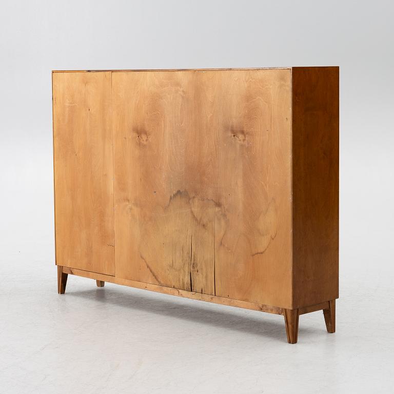 Bokhylla/ sideboard, omkring 1900-talets mitt.