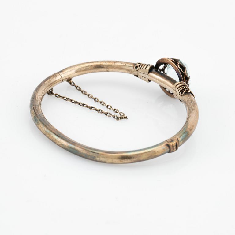 Arm ring, silver with aquamarine.