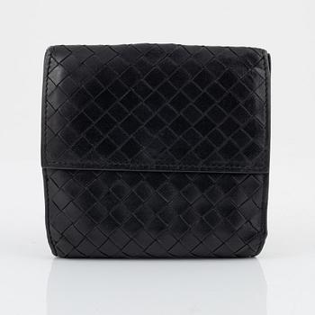 Bottega Veneta, a wallet and bracelet.