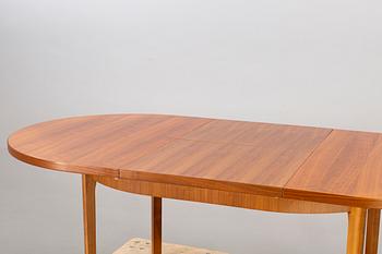 A mid 20th century teak dining table.